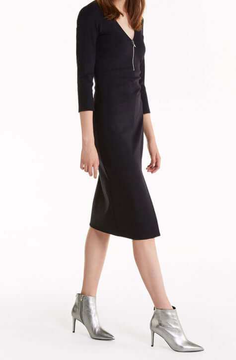 THIS FEMININE YET DARING MIDI DRESS HAS A CONTRASTING METAL ZIP AND FITS SNUGLY AROUND THE WAIST. Fitted waist Hand wash or dry clean Made in Italy Metal zip fastening at the front Midi cut The model is 1.76m and wears an Italian size 40 Three-quarter sl