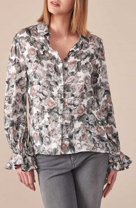 The LOAN is a floral printed viscose shirt featuring a pointed collar, a high-low hemline style and a concealed front button placket for closure. Anne Fontaine in-store Affairedefemmes.net