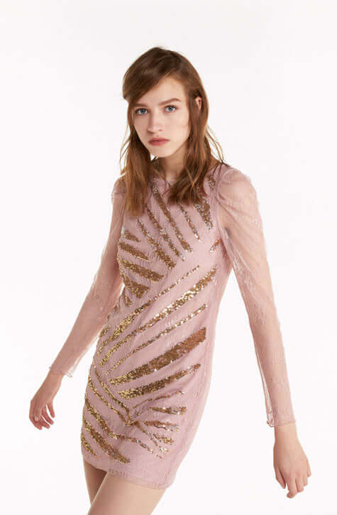 MASSES OF SPARKLING SEQUINS ILLUMINATE THIS ROMANTIC LACE MINI DRESS AND MAKE YOU SHINE.Close-fitting Dry clean Italian crafted embroidery with two-tone 3D sequins Lace lined with tonal Georgette Made in Italy Plunging back neckline with ties Short cut Th