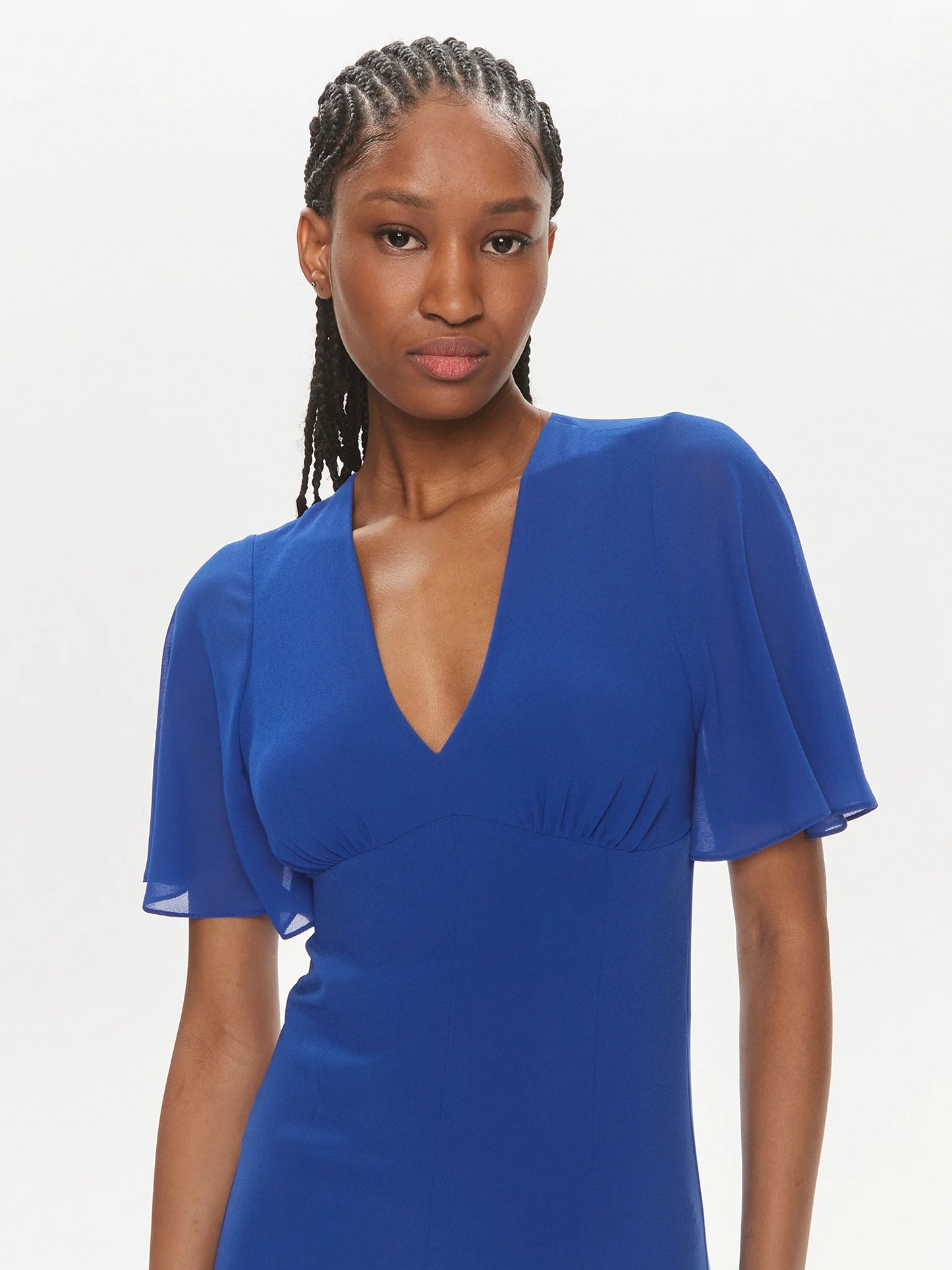 V-neck jumpsuit in sablé crepe fabric in Blue Wave