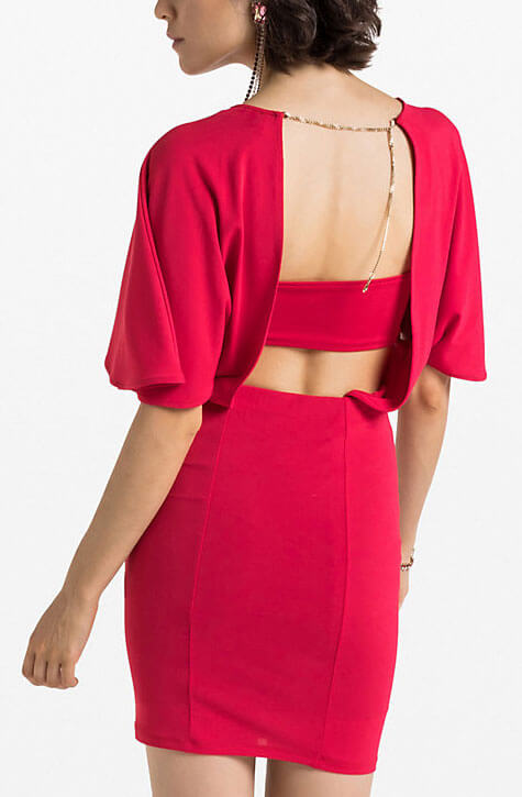 Red knee length dress with plunge neckline at the back; bandeau band accessories included. Patrizia Pepe available at our digital Boutique Affairedefemmes.net. 