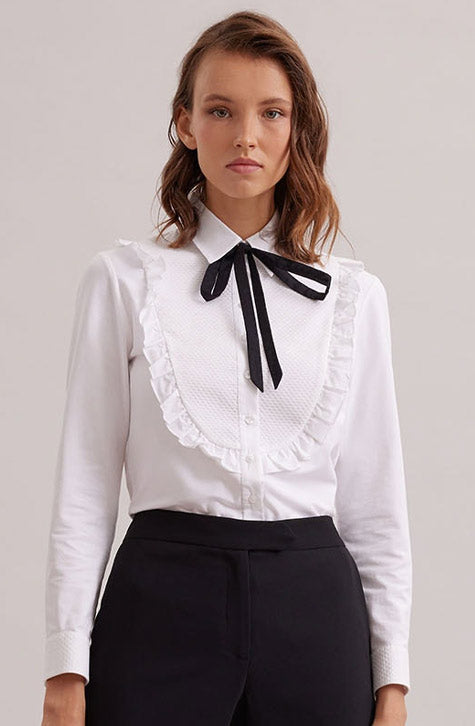 The MANUSCRIT is the perfect white shirt to complete your look. Featuring a large textured bib detail that is framed with a single ruffle. The classic collar, button placket and French cuffs that allow for cufflinks are cotton voile