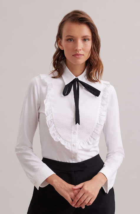 The MANUSCRIT is the perfect white shirt to complete your look. Featuring a large textured bib detail that is framed with a single ruffle. The classic collar, button placket and French cuffs that allow for cufflinks are cotton voile