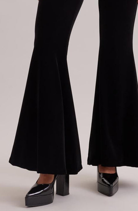 The VIC pants create the perfect blend between sophisticated and comfortable. Crafted from a black stretch-knit, the VIC pants sit high on the waist and feature fitted legs that flare out at the bottom to enhance the overall design. 