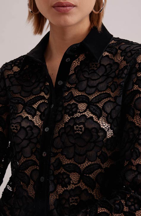 The SALINGER is a sheer black net shirt embroidered with lace floral patterns outlined in velvet. This luxurious piece features a point collar, center button placket and French cuffs that allows for cufflinks, all in black velvet. 