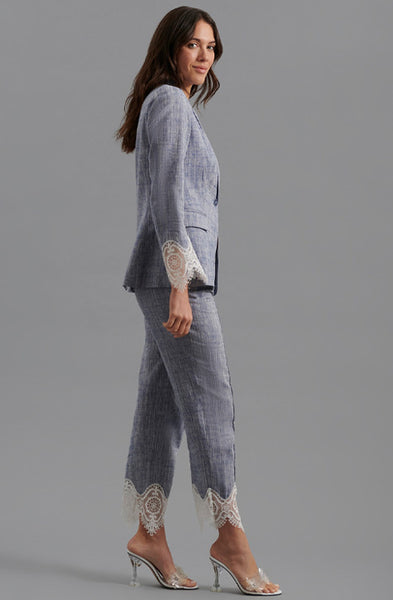 The VATXI is a long sleeve tailored linen jacket enhanced with openwork lace at the wrists. Designed with coordinating peak lapels and lightly padded shoulders, the VATXI jacket is completed with flattering darting to ensure a fitted silhouette.