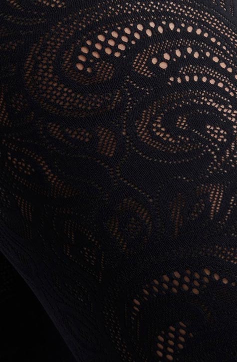 The COSMOS are pull on black cycling shorts made so that you can wear them comfortably from a workout to lunch with friends. The COSMOS are crafted from flexible stretch fabric and feature an open pointelle knit exposing the skin with an abstract pattern.