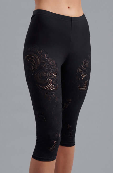 The COSMOS are pull on black cycling shorts made so that you can wear them comfortably from a workout to lunch with friends. The COSMOS are crafted from flexible stretch fabric and feature an open pointelle knit exposing the skin with an abstract pattern.