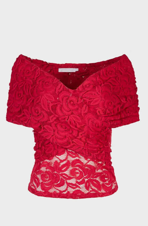 The JINKOA is an faux wrap top in pink lace. The JINKOA is enhanced with a subtle v-neckline and an off the shoulder sleeve.