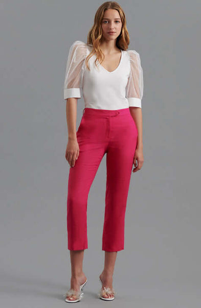 The AERIAL is a  pima cotton top enhanced with voluminous sleeves crafted from a sheer mesh fabric and featuring an elegant V-neckline. The AERIAL is both refined and understated making it a perfect addition to your wardrobe to wear to the office and for evening events.